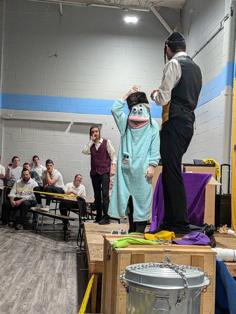 A volunteer in costume during an interactive routine